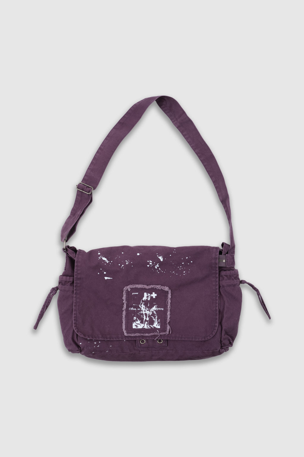Bandolera Thinking Splattered con pintura morada