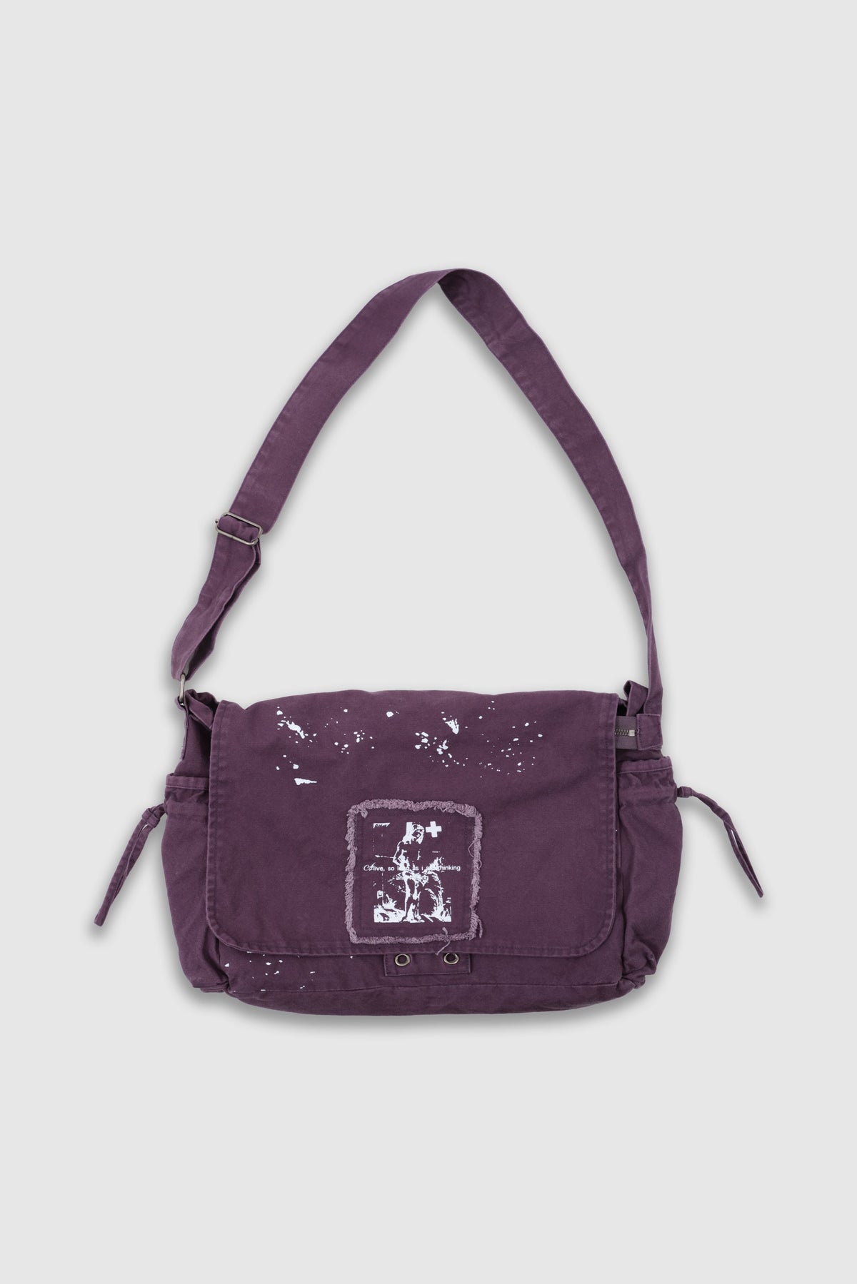 Bandolera Thinking Splattered con pintura morada