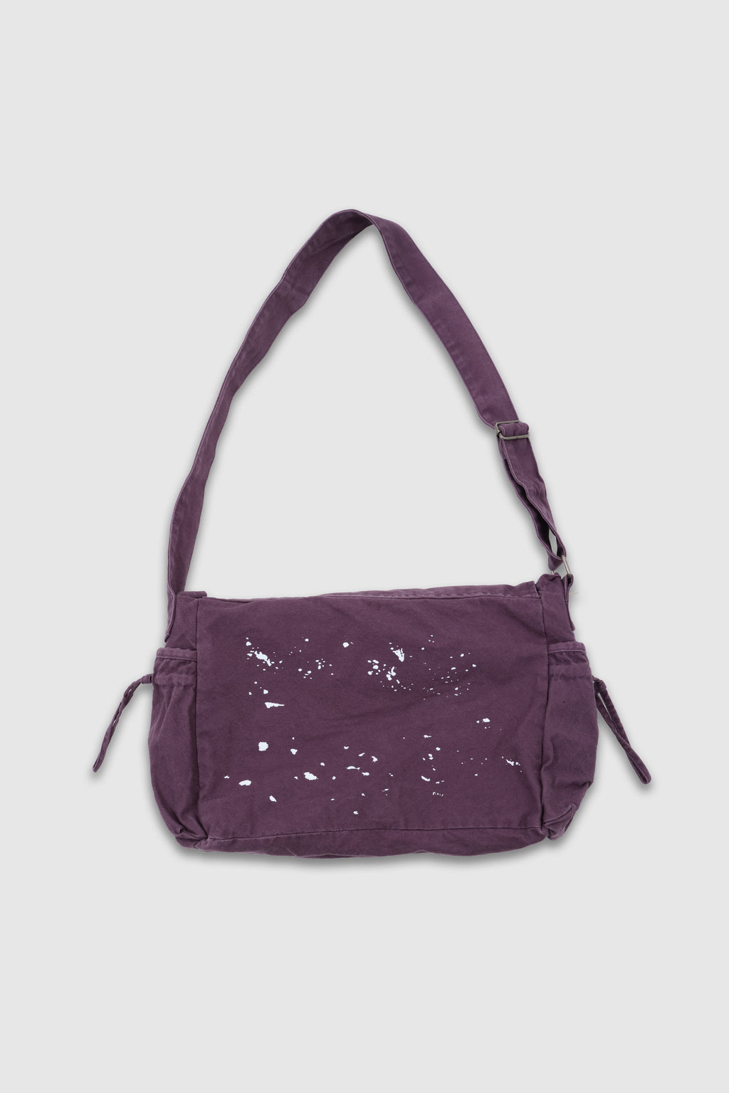 Bandolera Thinking Splattered con pintura morada