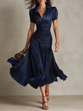 Lucía | Vestido midi plisado de rayas
