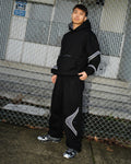 Pantalones deportivos cinéticos Negro / Gris metalizado