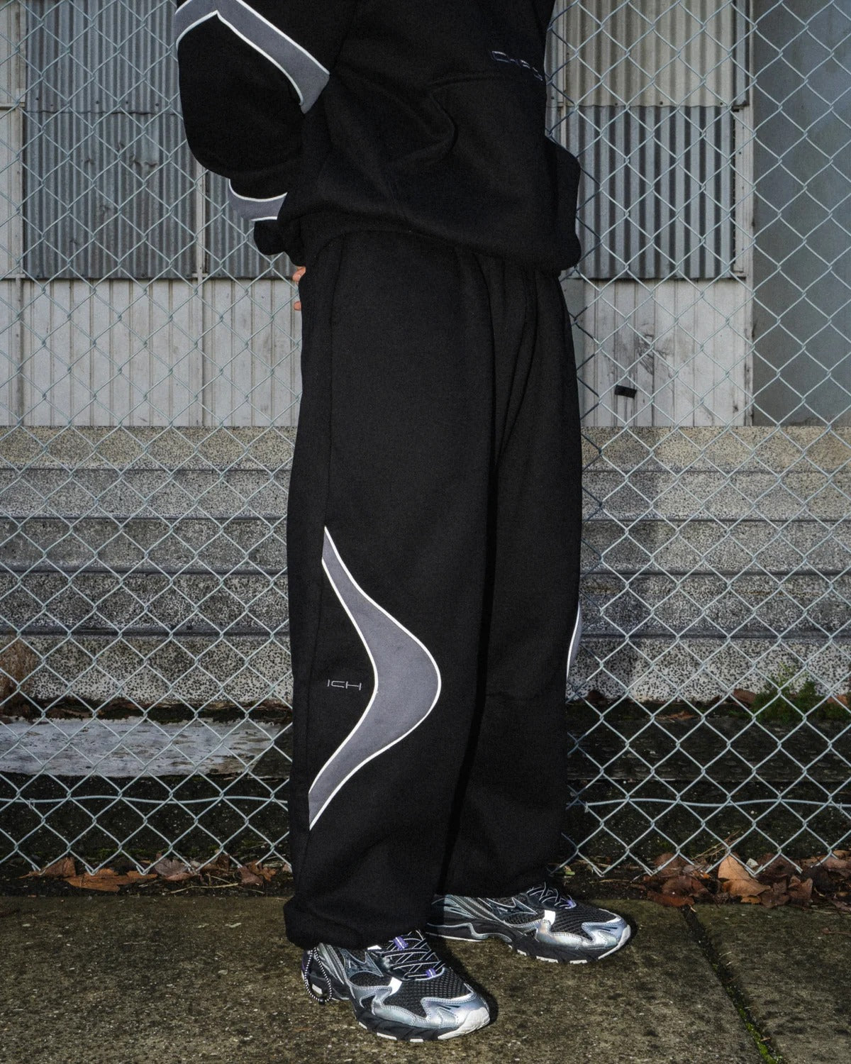 Pantalones deportivos cinéticos Negro / Gris metalizado