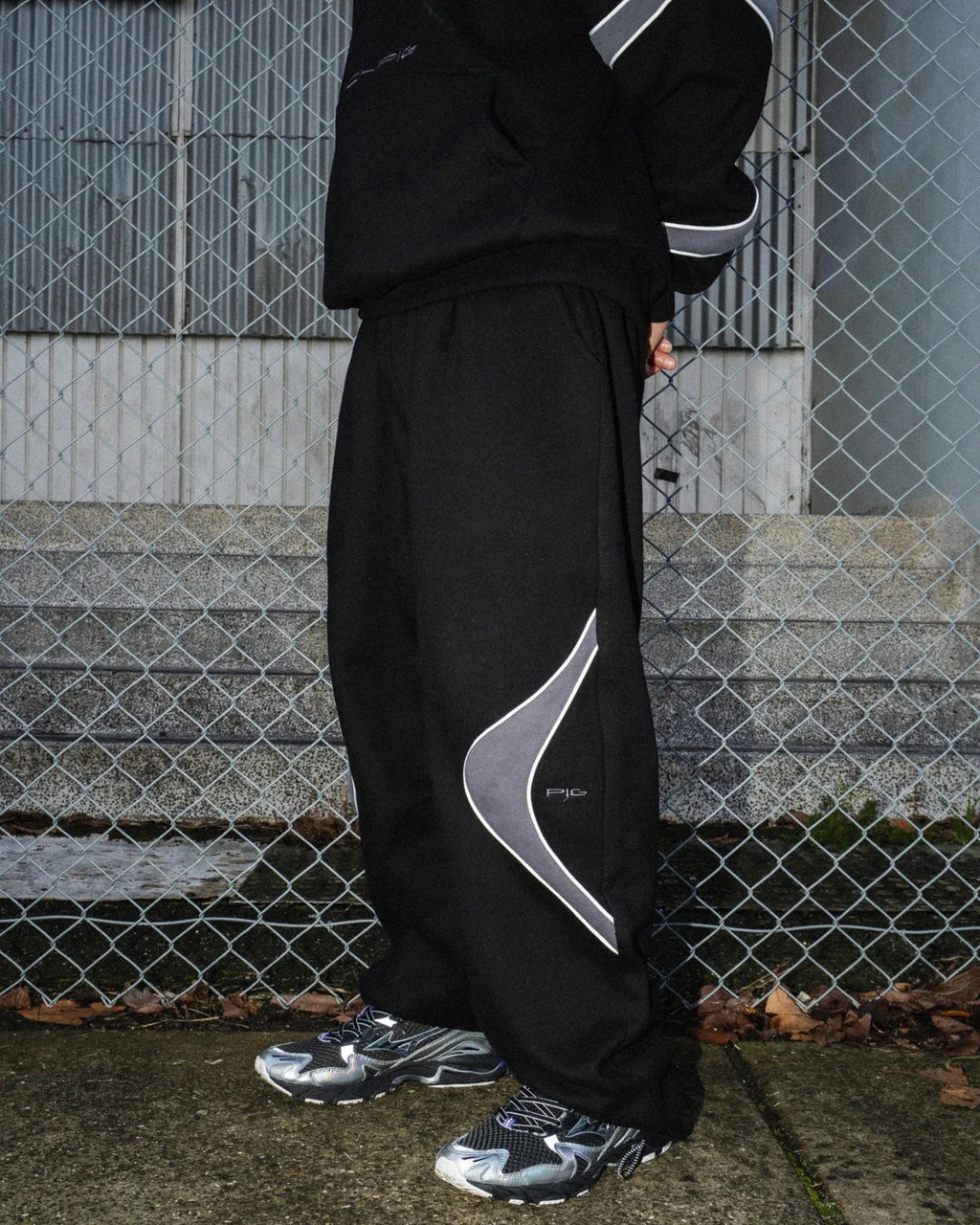 Pantalones deportivos cinéticos Negro / Gris metalizado